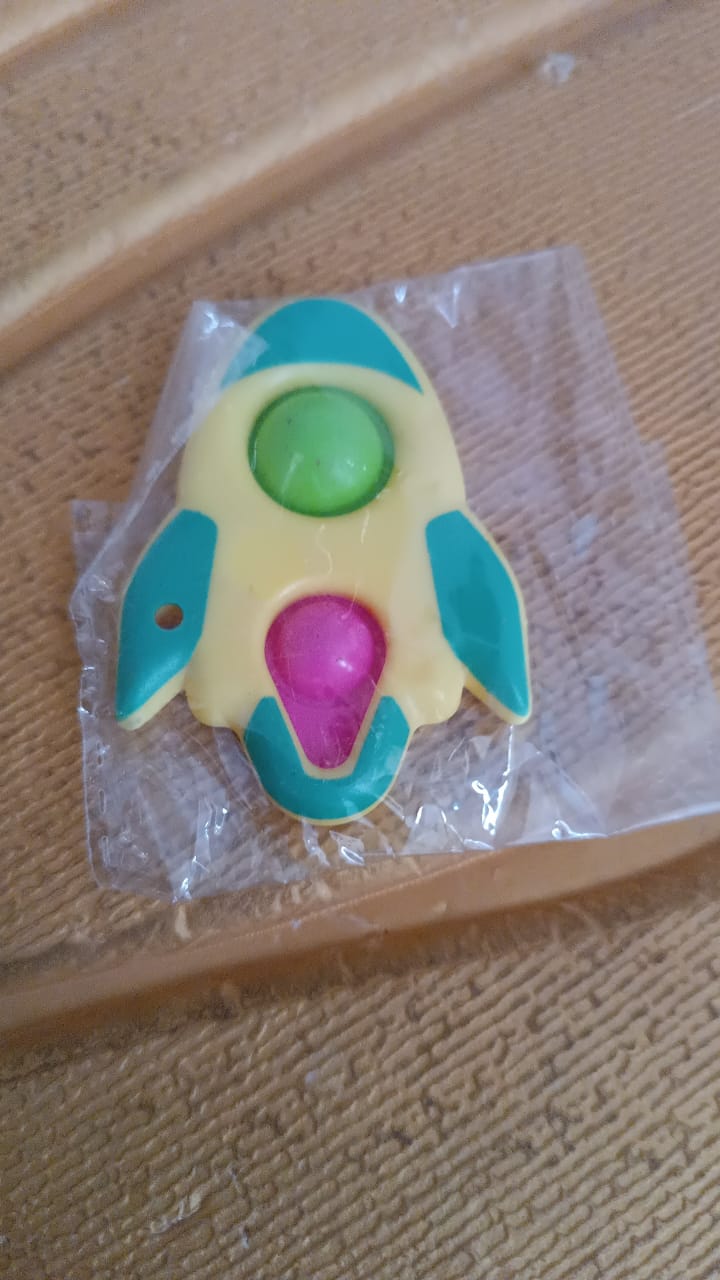 Rocket Shaped Dimple Keychain Toy (1 Pc) Signature kart