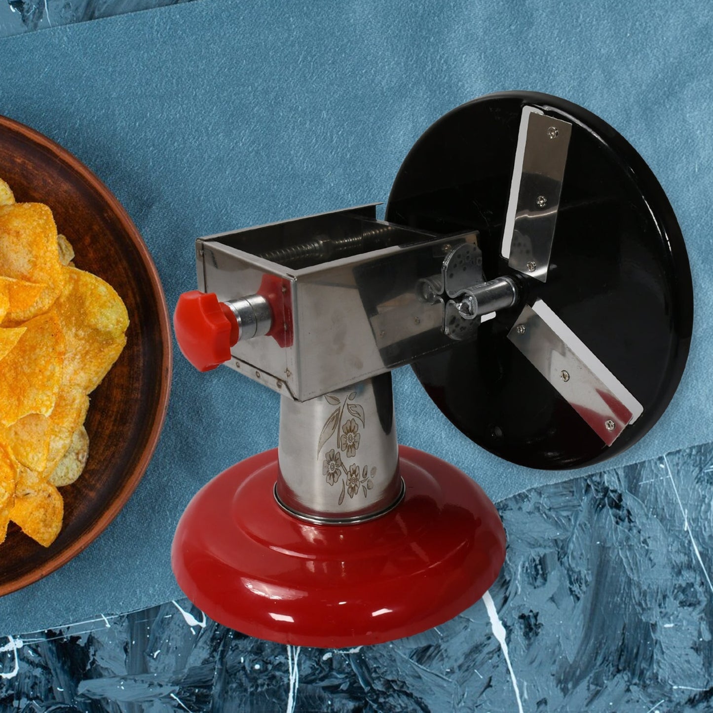Stainless Steel Chips Maker and Vegetable Slicer for Kitchen Potato Slicer Graters and Chippers. Chips Maker is Suitable for Vegetable Cuttings. Chips Maker Consist Hard Coated Iron Wheel and Stand. signaturekarts